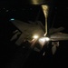 KC-135 refuels F-15Es at night