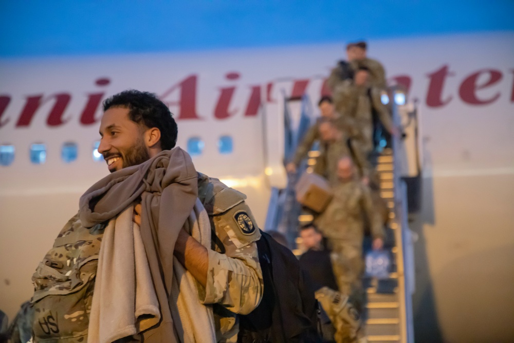 Soldiers with the 293rd Military Police Company, 385th Military Police Battalion reunite with loved ones after nine months in Europe