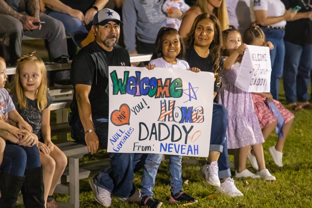 Soldiers with the 293rd Military Police Company, 385th Military Police Battalion reunite with loved ones after nine months in Europe