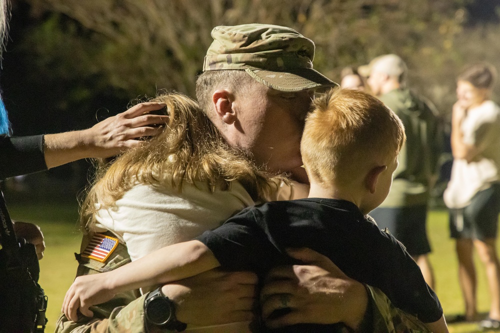 Soldiers with the 293rd Military Police Company, 385th Military Police Battalion reunite with loved ones after nine months in Europe