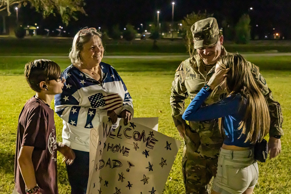 Soldiers with the 293rd Military Police Company, 385th Military Police Battalion reunite with loved ones after nine months in Europe