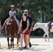 Families harness resilience at therapeutic horse event