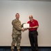 U.S. Air Force Col. Jeremy Raley, Space Vehicles Directorate commander awards Dr. Richard Erwin, Space Vehicles Directorate chief scientist the meritorious service award.