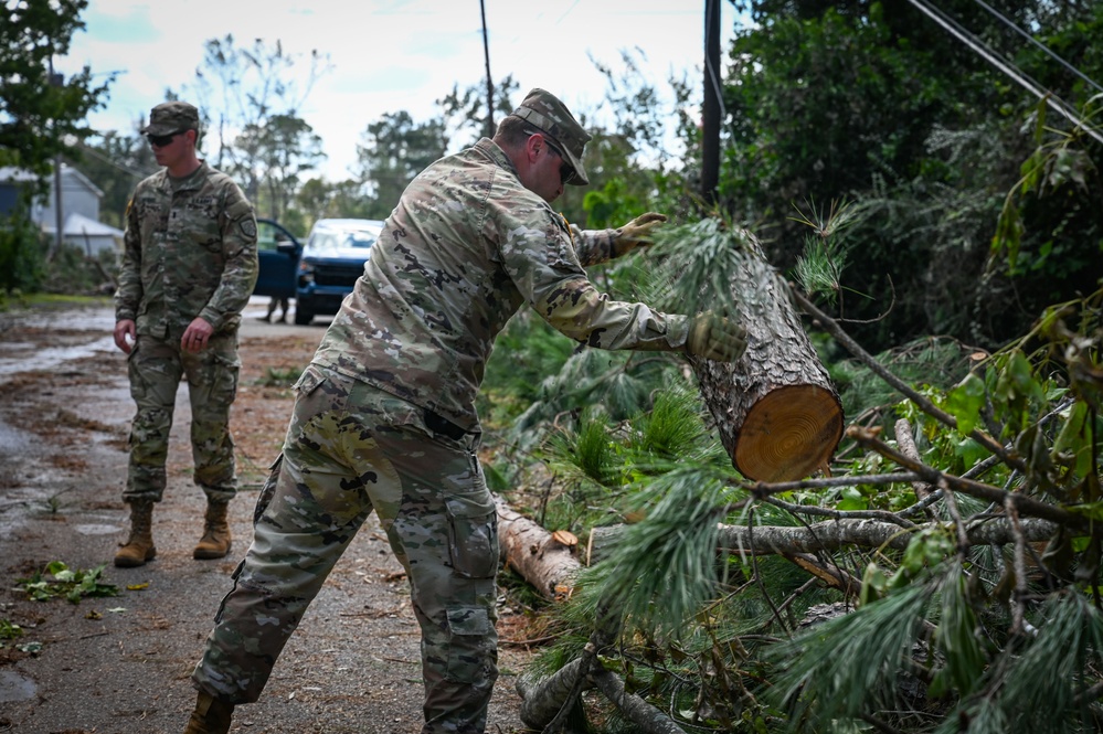 Georgia National Guard Soldiers conduct road clearing operations in Augusta