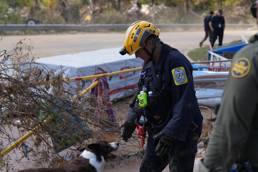 Urban Search and Rescue Team Member and Canine Handler Support Emergency Operations in Western North Carolina