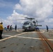 Sailors aboard the USS Howard conduct a passenger transfer with Sailors aboard the HMAS Sydney V in the South China Sea