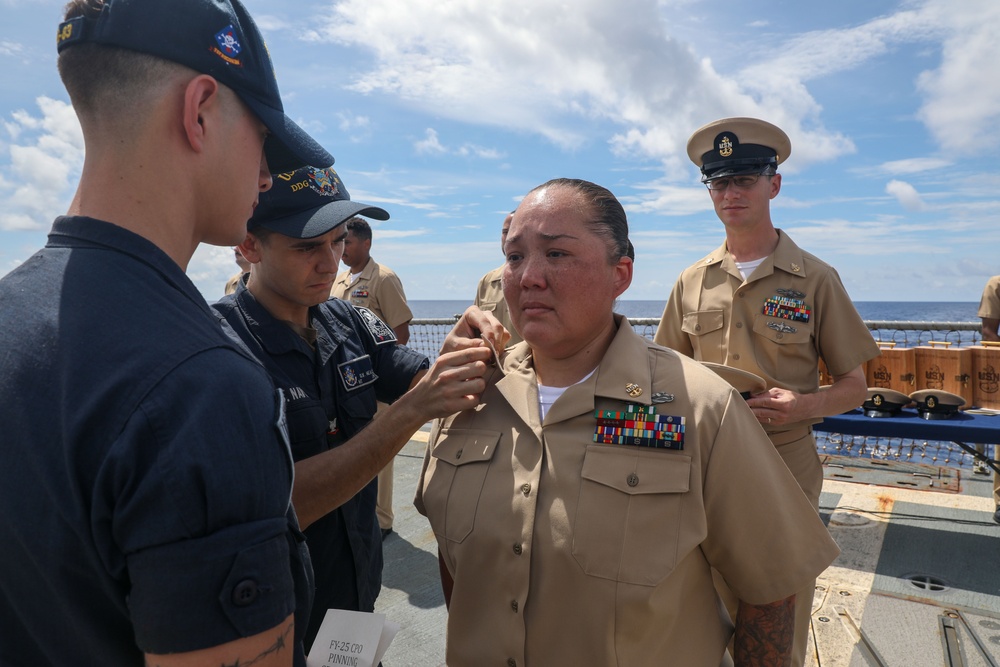 Sailors aboard the USS Howard conduct a Chief Petty Officer Pinning Ceremony in the South China Sea