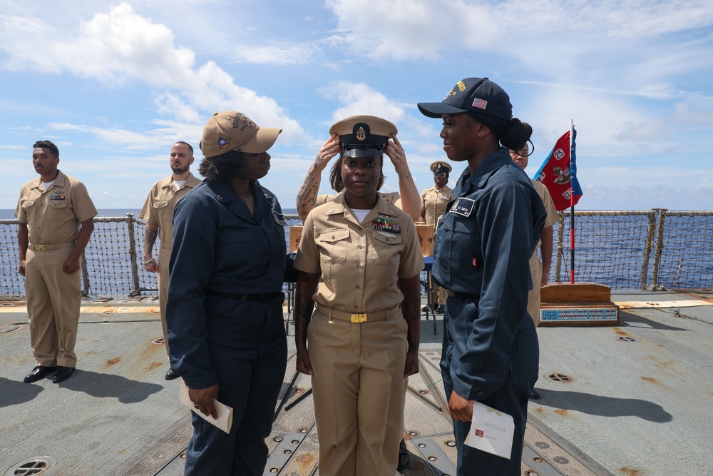 Sailors aboard the USS Howard conduct a Chief Petty Officer Pinning Ceremony in the South China Sea