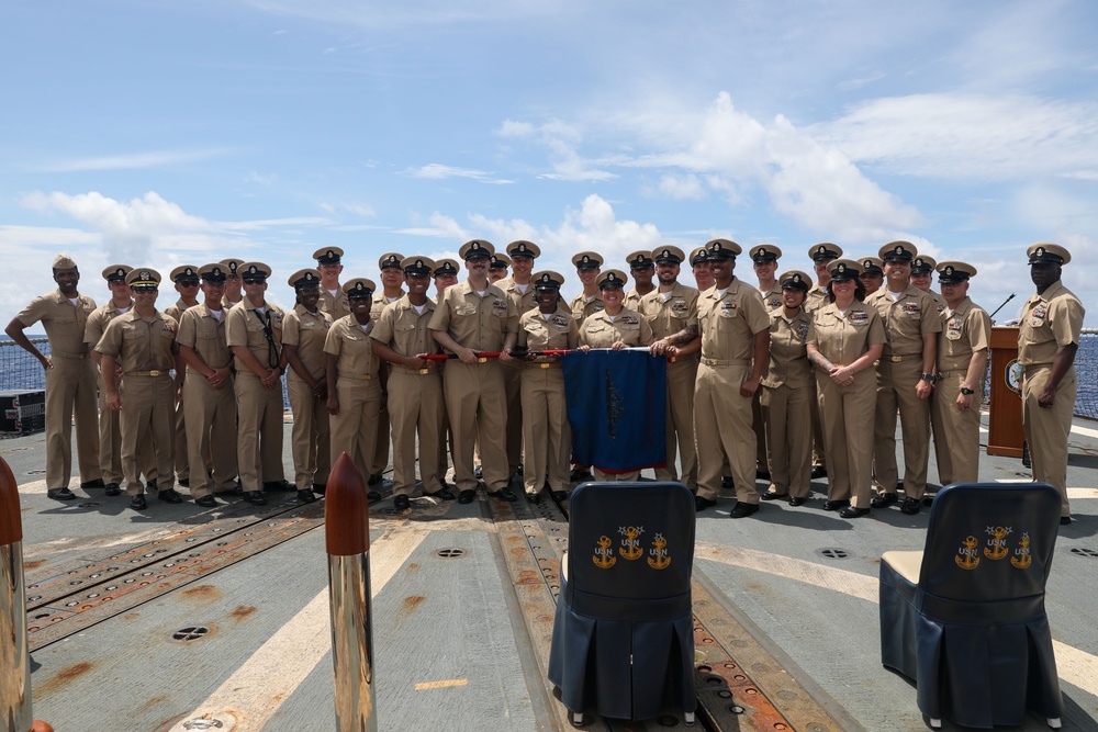 Sailors aboard the USS Howard conduct a Chief Petty Officer Pinning Ceremony in the South China Sea