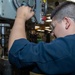 USS George Washington Sailors conduct maintenance and repairs