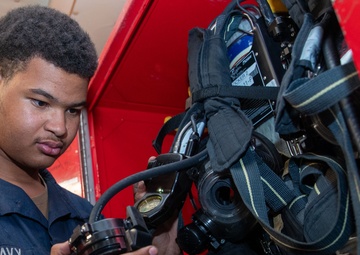 USS George Washington Sailors conduct maintenance and repairs