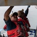 USS Tripoli Sailors Preform ship maintenance