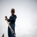 USS Tripoli Sailors Preform ship maintenance
