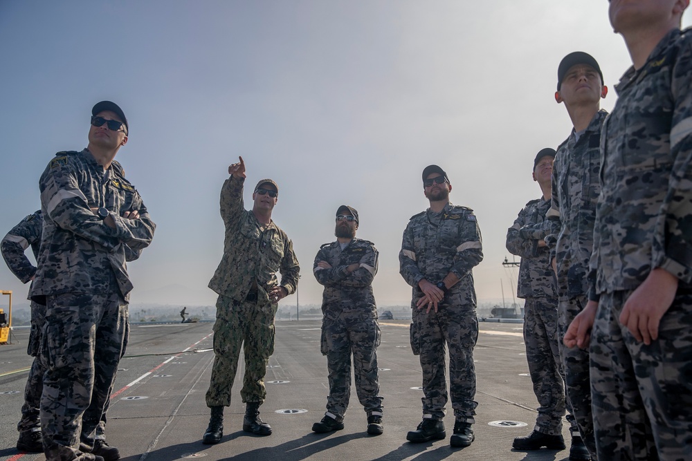 Royal Austrailian Navy sailors tour USS Tripoli (LHA7)