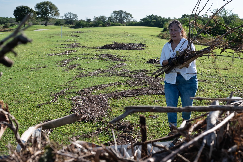 Volunteers and Staff clean up MacDill AFB Golf course following Hurricane Helene