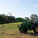 Volunteers and Staff clean up MacDill AFB Golf course following Hurricane Helene