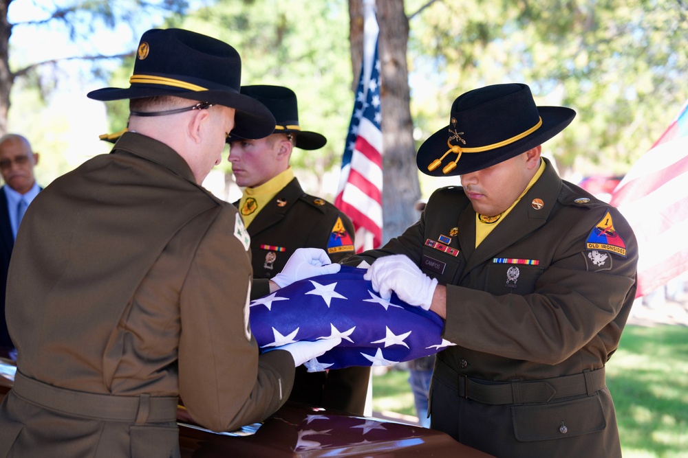 1-1 Cav troopers finish folding flag