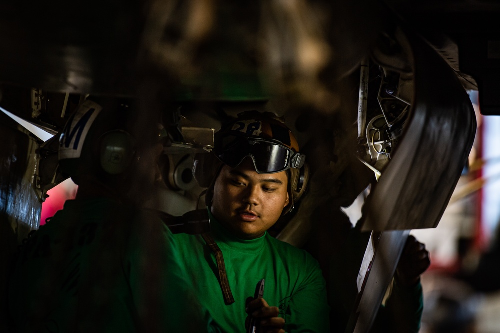 Nimitz Sailors Perform Maintenance on Aircraft