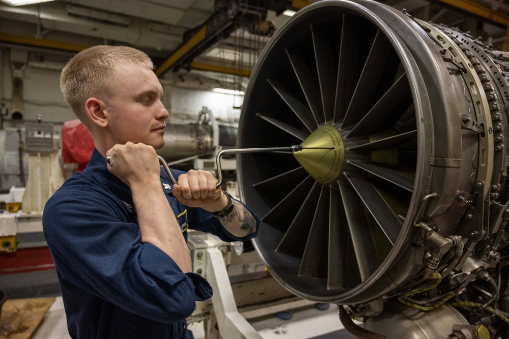 Nimitz Sailor Disassembles Jet Engine
