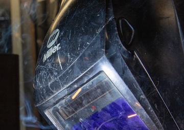 George Washington Sailor welds metal