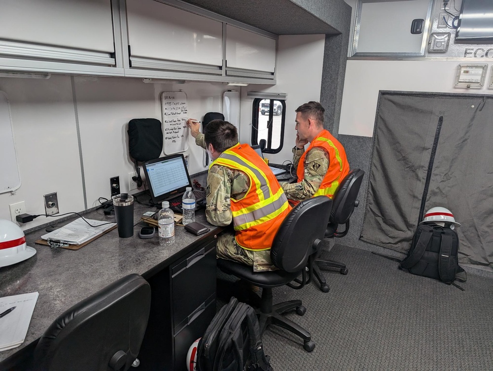 249th EN BN PIIT Boss and assistant PIIT Boss reviewing and updating inspection team movements. (249th Soldiers pictured are SSG Koptchak and SSG Hannsz)