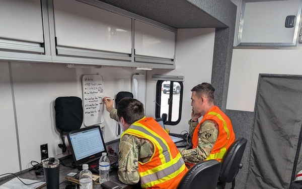 249th EN BN PIIT Boss and assistant PIIT Boss reviewing and updating inspection team movements. (249th Soldiers pictured are SSG Koptchak and SSG Hannsz)