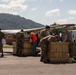 Tennessee Army National Guardsmen and volunteers assist in unloading supplies at Elizabethton Airport