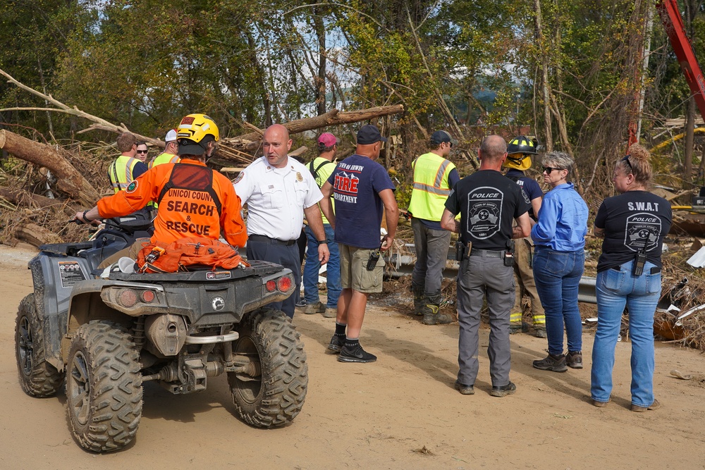 Emergency Personnel Clearing Debris from Hurricane Helene in Erwin, TN