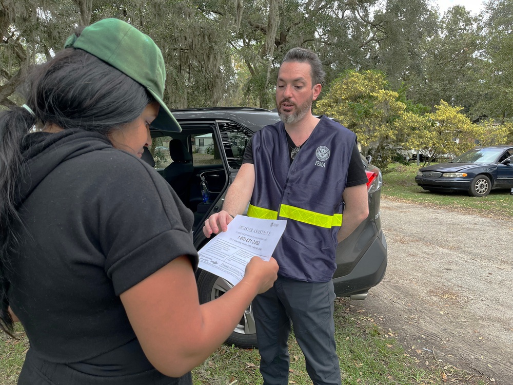 FEMA Disaster Survivor Assistance Outreach Specialist Assisting Residents Following Hurricane Helene in Walthourville, Georgia