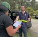 FEMA Disaster Survivor Assistance Outreach Specialist Assisting Residents Following Hurricane Helene in Walthourville, Georgia