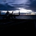 Theodore Roosevelt Transits the Pacific Ocean During Sunrise