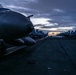 Theodore Roosevelt Transits the Pacific Ocean During Sunrise