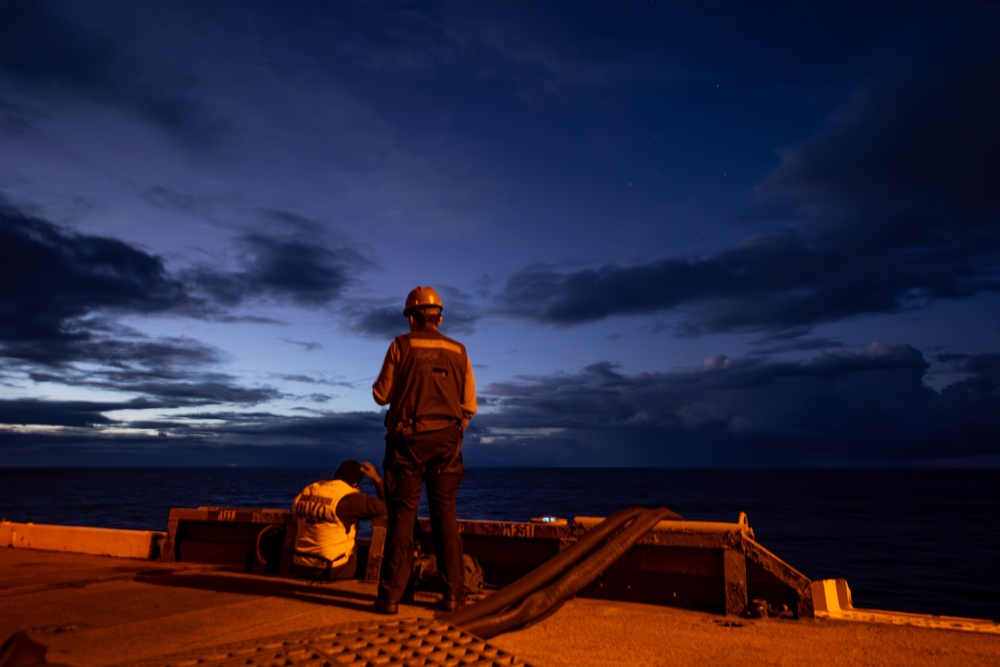 Theodore Roosevelt Transits the Pacific Ocean During Sunrise