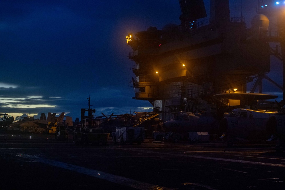 Theodore Roosevelt Transits the Pacific Ocean During Sunrise