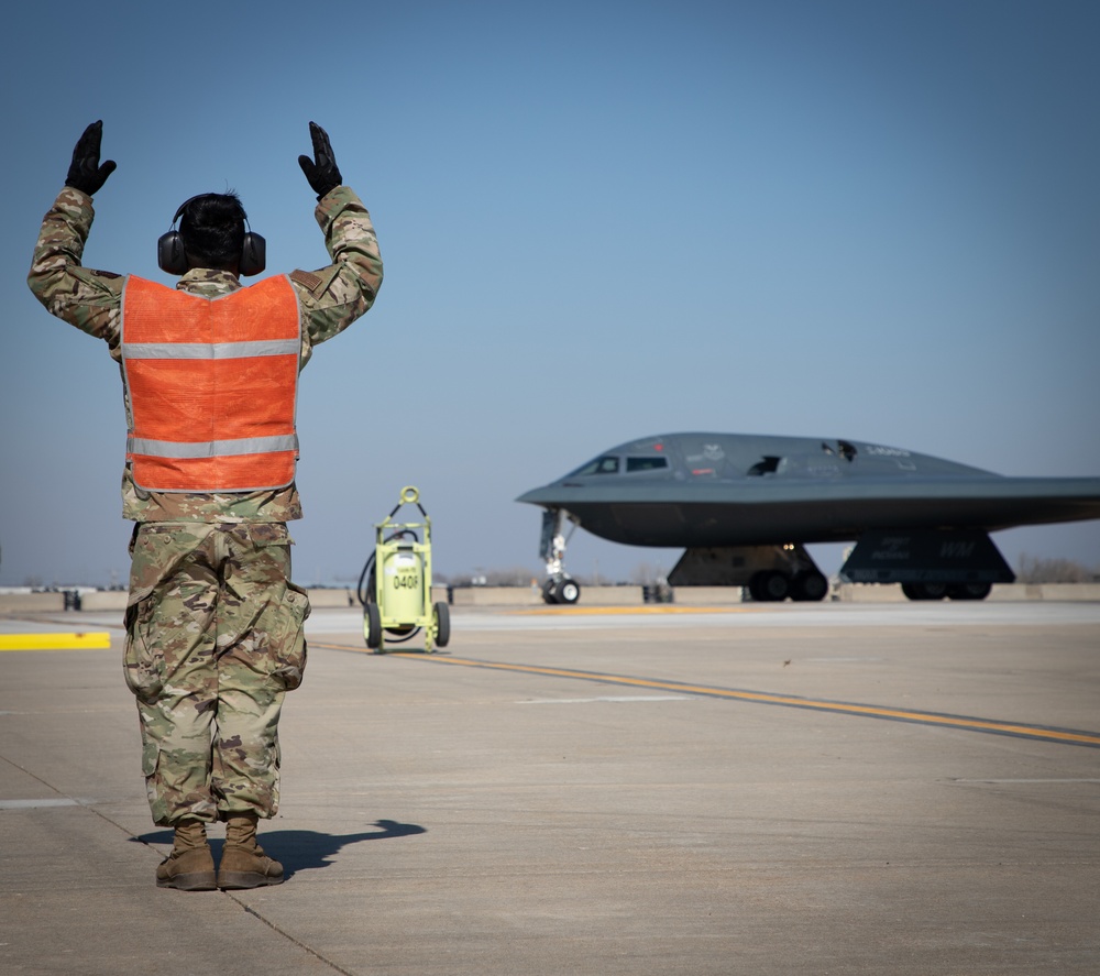 131st Bomb Wing &amp; the 190th Air Refueling Wing participate in a hot pit refueling of a B-2 Spirit Bomber