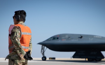 131st Bomb Wing &amp; the 190th Air Refueling Wing participate in a hot pit refueling of a B-2 Spirit Bomber