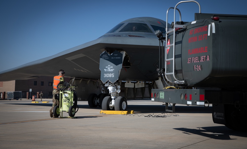 131st Bomb Wing &amp; the 190th Air Refueling Wing participate in a hot pit refueling of a B-2 Spirit Bomber