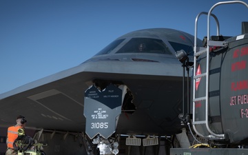 131st Bomb Wing &amp; the 190th Air Refueling Wing participate in a hot pit refueling of a B-2 Spirit Bomber