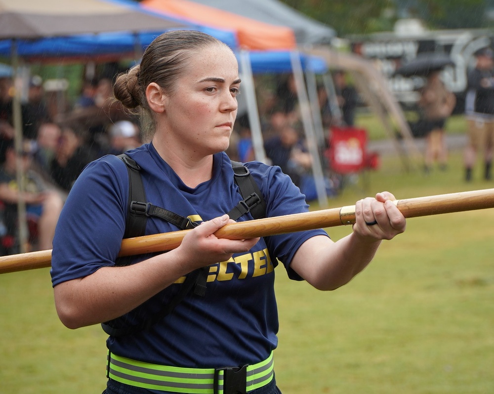 Dam Neck Annex CPO Selects compete in cadence and guidon competition in the pouring rain