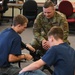 Enlistees with the 119th Wing practice rifle assembly