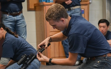 Enlistees with the 119th Wing practice rifle assembly