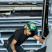 USS George Washington conducts maintenance in hangar bay