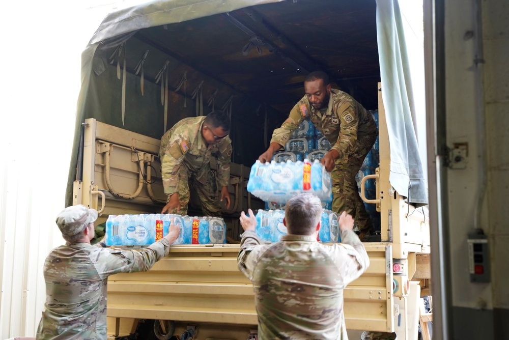 Active duty soldiers from the 82nd Airborne and the 20th Engineer Brigade from Fort Liberty, North Carolina, transported three 5-ton MTVs worth of food and water to the French Broad Fire and Rescue station.