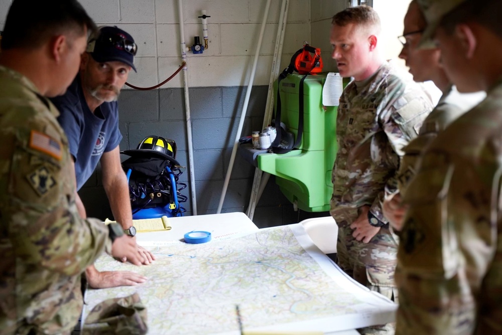 Active duty soldiers from the 82nd Airborne and the 20th Engineer Brigade from Fort Liberty, North Carolina, transported three 5-ton MTVs worth of food and water to the French Broad Fire and Rescue station.