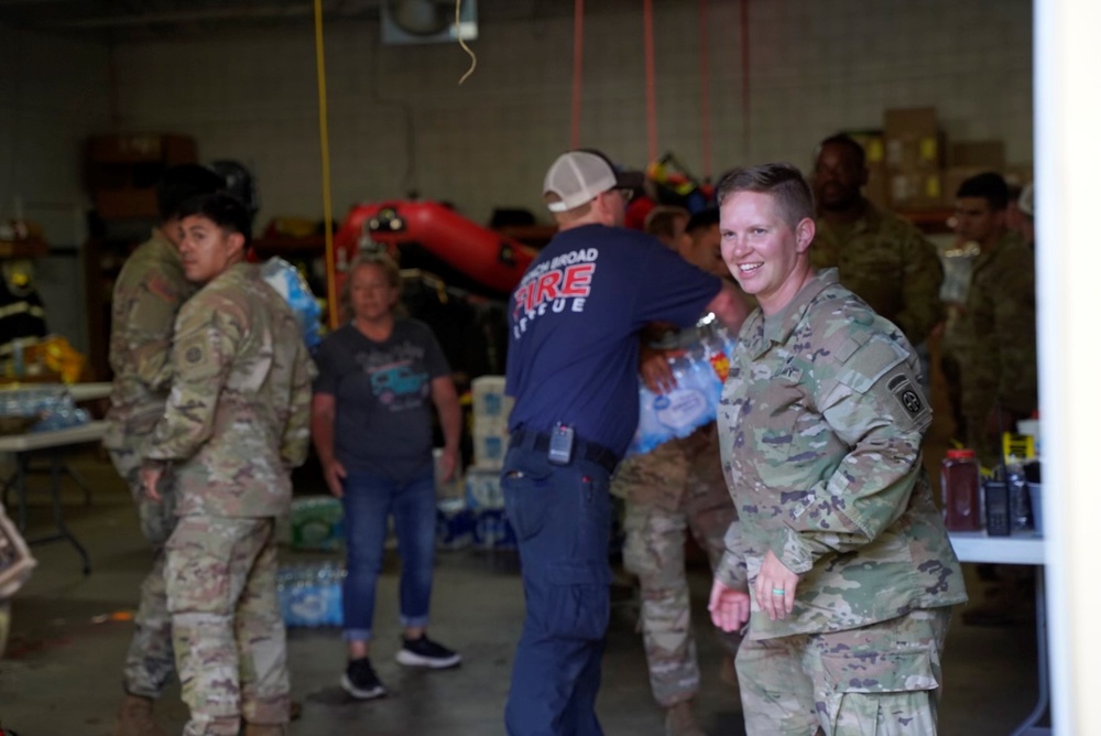 Active duty soldiers from the 82nd Airborne and the 20th Engineer Brigade from Fort Liberty, North Carolina, transported three 5-ton MTVs worth of food and water to the French Broad Fire and Rescue station.