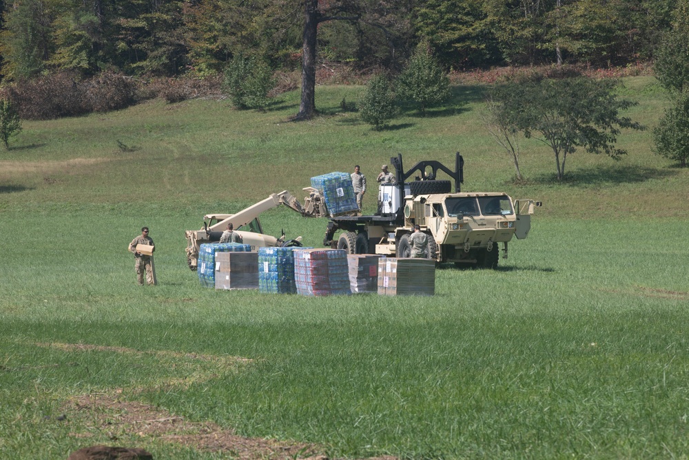 U.S. Army, 3rd Expeditionary Sustainment Command (ESC), 330th Movement Control Battalion (MCB), load food, water, and other resources