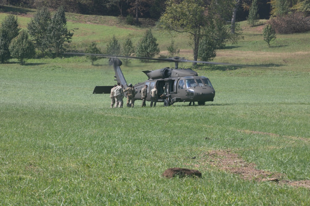 U.S. Army, 3rd Expeditionary Sustainment Command (ESC), 330th Movement Control Battalion (MCB), load food, water, and other resources