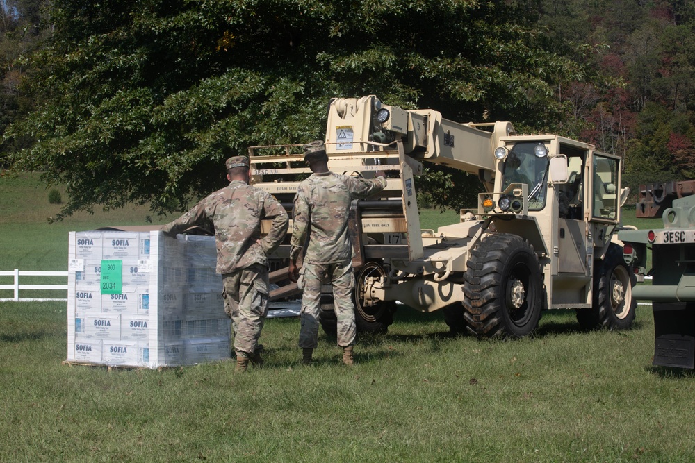 U.S. Army, 3rd Expeditionary Sustainment Command (ESC), 330th Movement Control Battalion (MCB), load food, water, and other resources