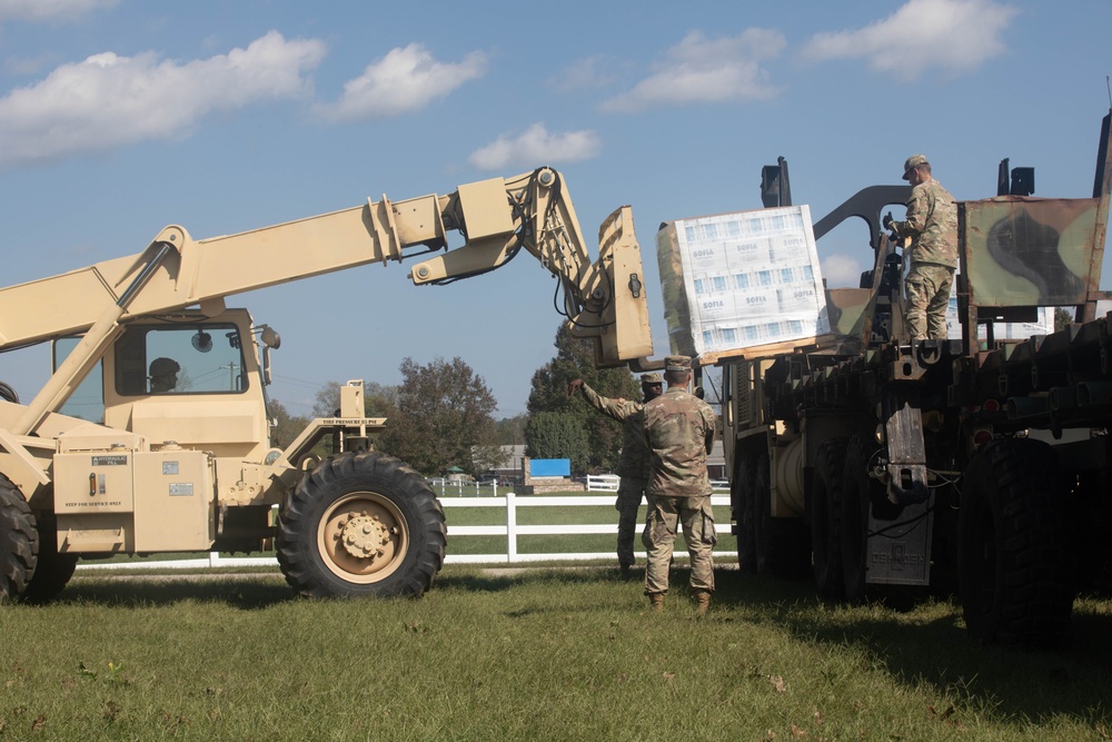 U.S. Army, 3rd Expeditionary Sustainment Command (ESC), 330th Movement Control Battalion (MCB), load food, water, and other resources