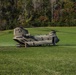 A U.S. Army CH-47 “Chinook” helicopter and its crew prepare to take-off from a campsite in response to Hurricane Helene